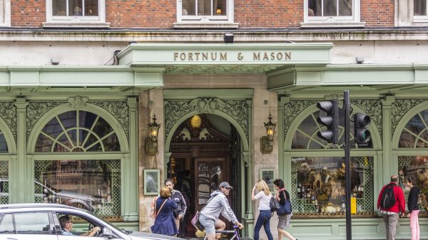 Shoppers at Fortnum & Mason have complained about the difficulties of ordering online, and contacting customer services during the festive period, the London grocery building depicted here with pedestrians walking by