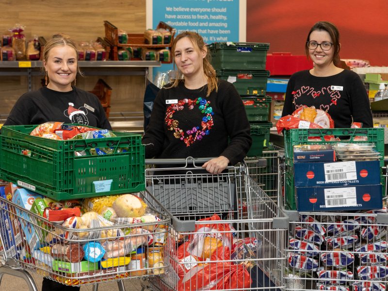 Aldi has donated over 1.5 million meals to charities over the Christmas and New Year period to help support households in need over the festive season, here depicting Aldi staff in festive attire with trolleys full of donated food