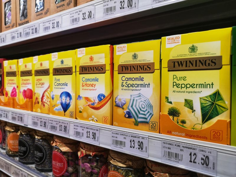 Associated British Foods (ABF)has delivered strong first quarter results, following international brands such as Twinings trading well across its key markets, here depicting Twinings in store