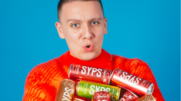 Aitch with cans of Syps -launching exclusively in Iceland