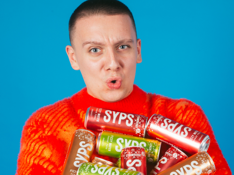 Aitch with cans of Syps -launching exclusively in Iceland