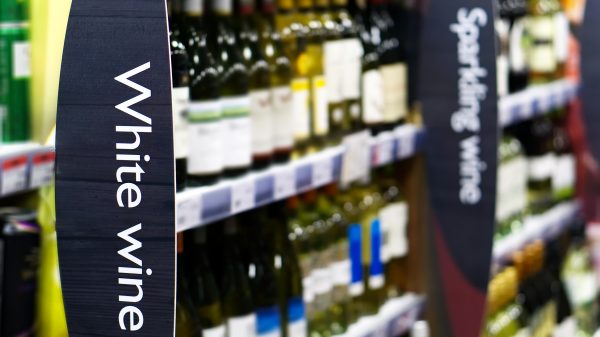 Consumers are switching to smaller higher-quality alcoholic drinks in a move linked to "moderation trends and financial factors", say experts, here depicting wine a in a supermarket