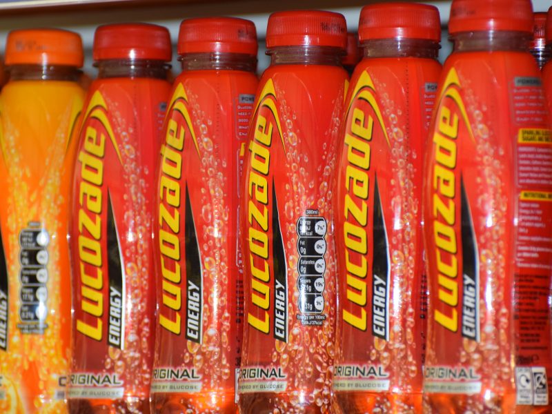Here depicting Lucozade on a shelf