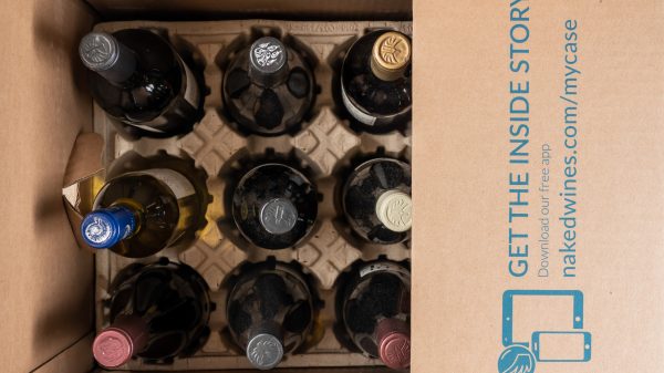 Here showing a full branded box on Naked Wines wine bottles in a bird-eye view