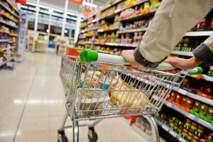 Here depicting a shopping trolley - Food inflation dropped to 5.0% in February as it fell to its lowest point in two years, but the BRC has warned that "significant uncertainties remain".