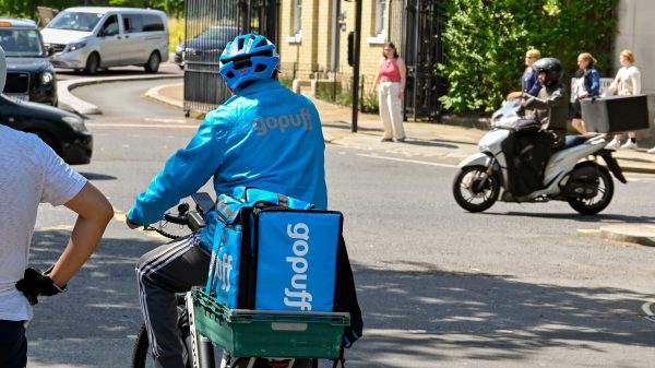 Here showing a GoPuff delivery rider