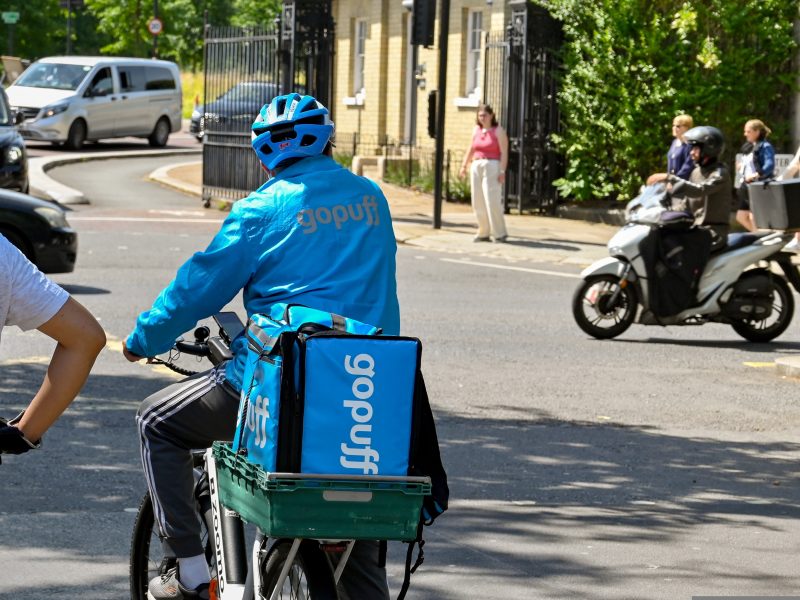 Here showing a GoPuff delivery rider