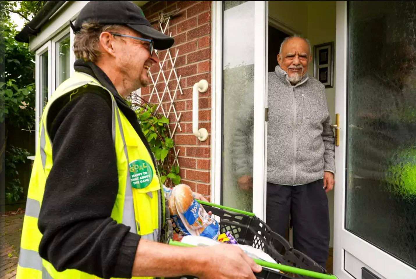 Asda delivery drivers are to wear 'Happy to Chat about the game' badges in the return of its initiative aimed at tackling loneliness.