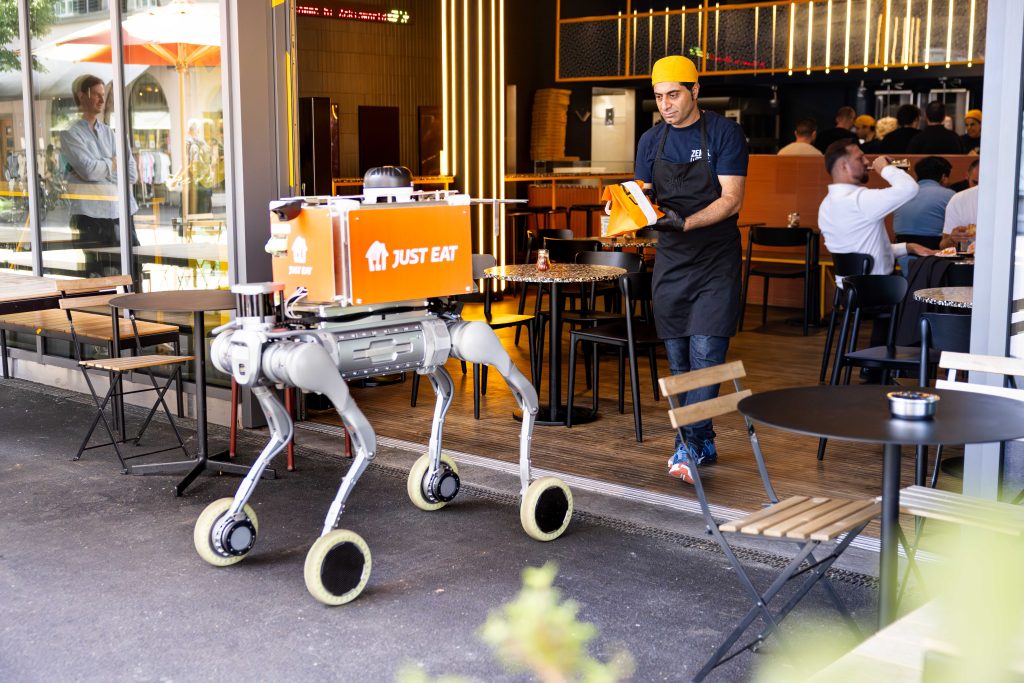 Just Eat Takeaway.com has launched a European first by trialling a new generation of delivery robots equipped with “physical AI”.
